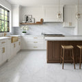 Bianco Carrara Honed 12x24 Marble Tile — Kitchen floor