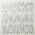 Bianco Congelato Marble 1x4 Leathered Dolomite Herringbone Mosaic close-up
