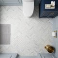 Bianco Congelato Marble 1x4 Leathered Dolomite Herringbone Mosaic — Powder Room floor