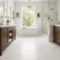 Bianco Congelato Marble 12x24 Leathered Dolomite Tile — Primary Bath floor