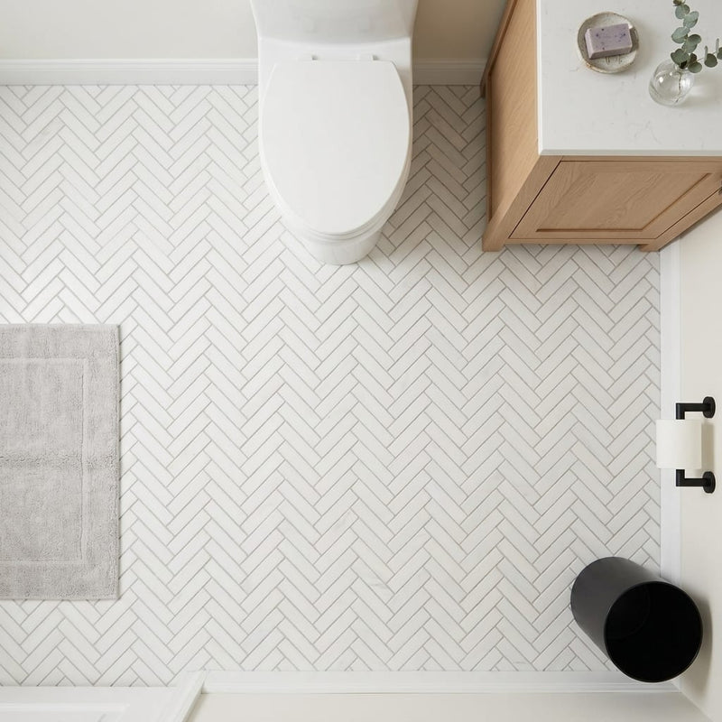 Bianco Dolomiti (White Dolomite) 1x4 Honed Herringbone Mosaic — Powder Room floor