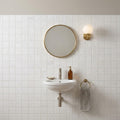 Bianco Dolomiti (White Dolomite) 2x2 Honed Mosaic — Powder Room wall