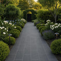Black Basalt 12x24 Tumbled Stone Paver — Garden path