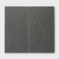 Black Basalt Paver 12x24 Tumbled 1.25 inch close-up