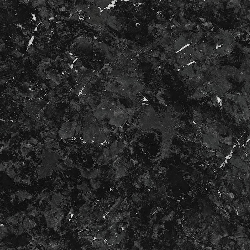 Black Lotus 2cm honed quartzite slab close-up with dark charcoal mineral patches and scattered small white mineral fragments.