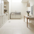 Blavet Blanc Limestone Tile 12x12 Honed 3/8 inch — Basement floor
