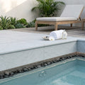 Blue Island Marble Leather (Sandblasted & Brushed) 16 x 24 x 1.25 Bullnose Coping 16x24 pool coping — Spa spa overhang edge