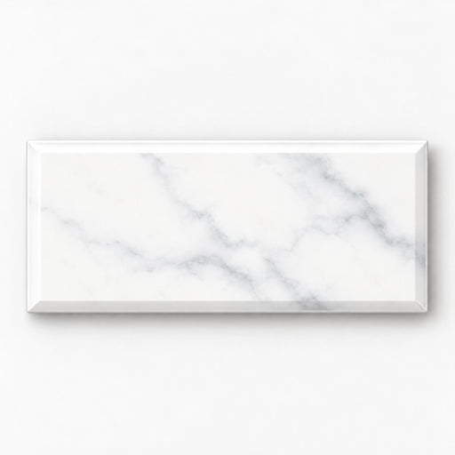 Single Bright Statuary 3x6 beveled ceramic wall tile shown horizontally with subtle gray veining.