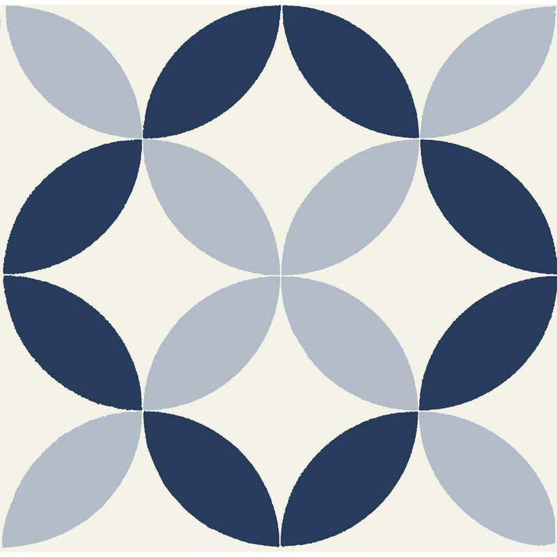 Broadway Hope Blue 8x8 matte porcelain tile with navy and pale blue curved petal motifs forming a symmetrical geometric pattern on a cream background.