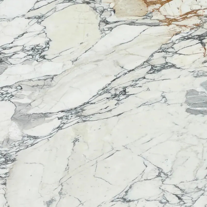 Calacata Arabescato Corchia 2cm honed marble slab with an ivory-white background and natural grey and golden-brown veining.