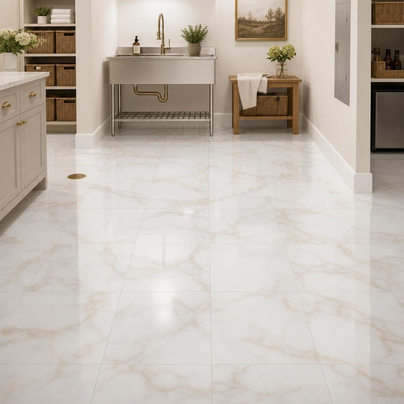 Calacata Gold 12x12 Polished Veined Marble Tile — Basement floor