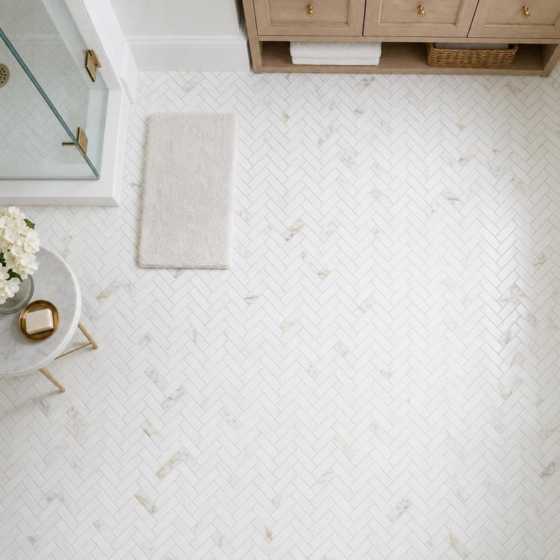 Calacata Gold Herringbone 1x2 Honed Veined Marble Mosaic — Bathroom floor