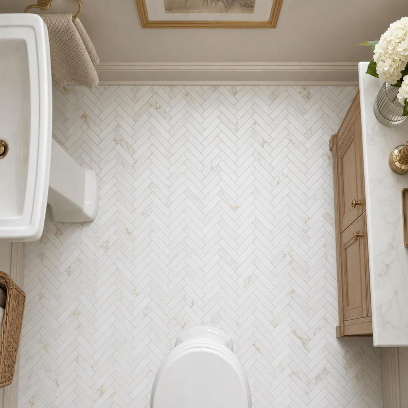Calacata Gold Herringbone 1x2 Honed Veined Marble Mosaic — Powder Room floor