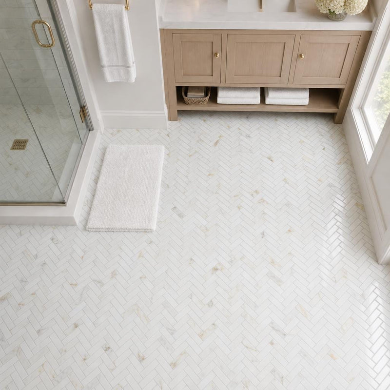 Calacata Gold Herringbone 1x2 Polished Veined Marble Mosaic — Bathroom floor