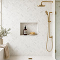 Calacata Gold Herringbone 1x4 Honed Veined Marble Mosaic — Bathroom shower wall