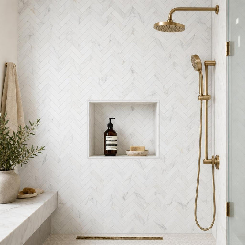 Calacata Gold Herringbone 1x4 Polished Veined Marble Mosaic — Bathroom shower wall