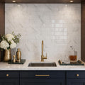 Calacatta Gold 3x6 Deep Beveled Polished Veined Marble Tile — Wet Bar backsplash
