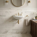 Calacatta Gold 4x16 Honed Marble Tile — Powder Room wainscot