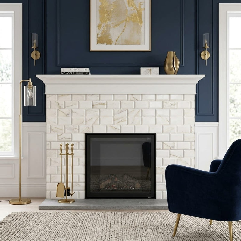 Calacatta Gold (Italian) Marble 3x6 Honed Tile — Living Room fireplace surround