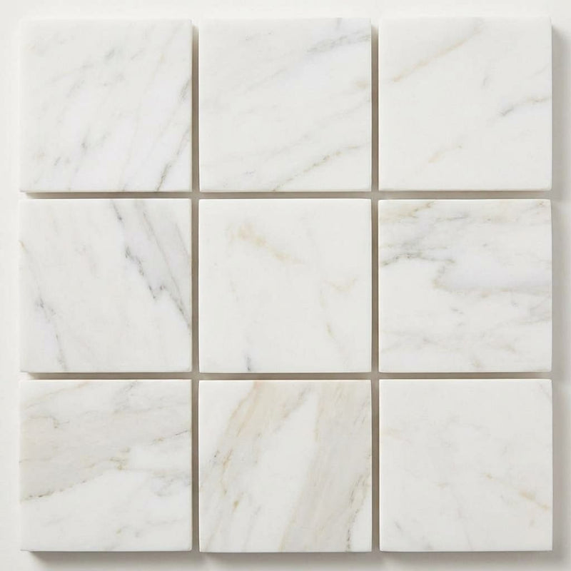 Calacatta Gold (Italian) Marble 5/8x5/8 Honed Mosaic close-up