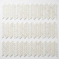 Calacatta Oliva Marble 1x3 Honed Herringbone Mosaic close-up