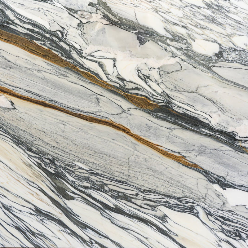 Calacatta Picasso 2cm honed marble slab with an ivory-white background and flowing charcoal-grey and golden-brown veins.