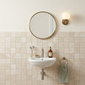 Capri Champagne 2x2 Honed Limestone Mosaic — Powder Room wall
