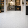 Carrara White 12x12 Honed Veined Marble Tile — Basement floor