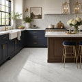 Carrara White 12x24 Honed Marble Tile — Kitchen floor