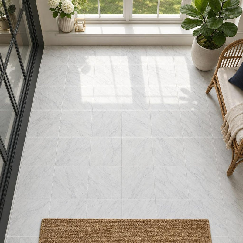 Carrara White (C) 12x12 Honed Marble Tile — Sunroom floor