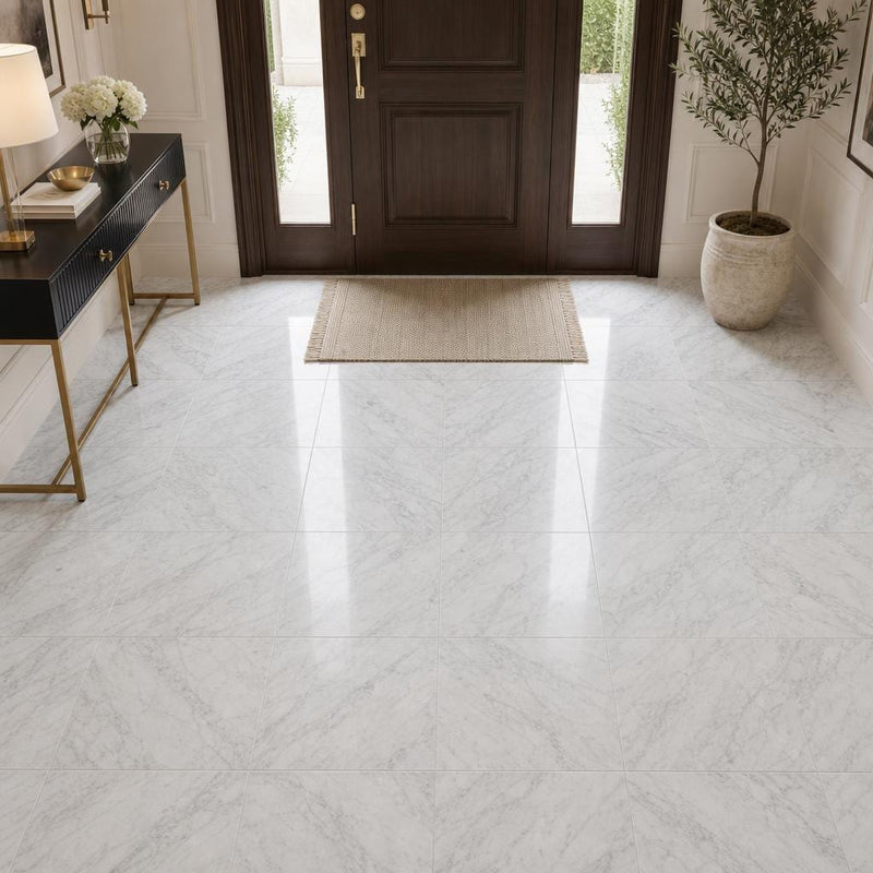 Carrara White (C) 18x18 Honed Marble Tile — Foyer floor
