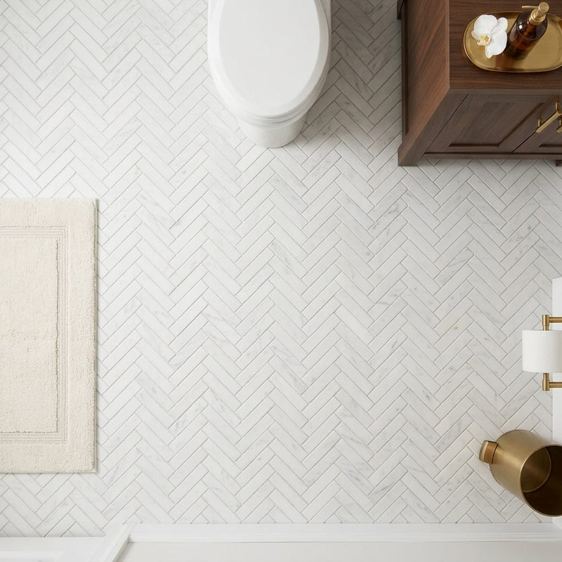 Carrara White (Italian) Marble 1x4 Honed Herringbone Mosaic — Powder Room floor