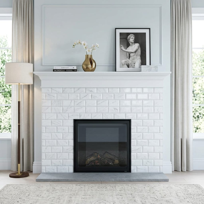 Carrara White (Italian) Marble 3x6 Tumbled Tile — Living Room fireplace surround