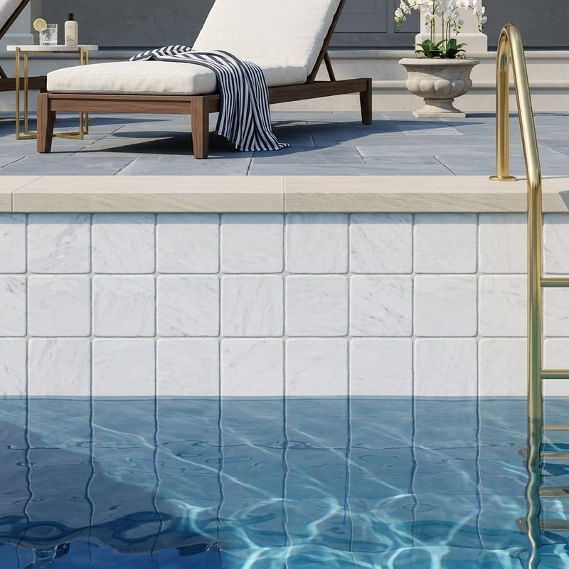 Carrara White (Italian) Marble 4x4 Tumbled Tile — Swimming Pool waterline