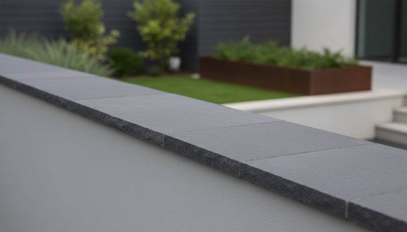 Close-up of Indian Black Limestone Natural 21 x 21 x 2 Limestone Column Cap Cap, in Indian Black tones.