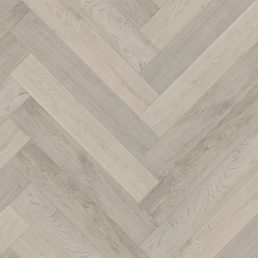Celeste Herringbone Chaumont 6x36 3mm European oak hardwood flooring in a light greige herringbone pattern.