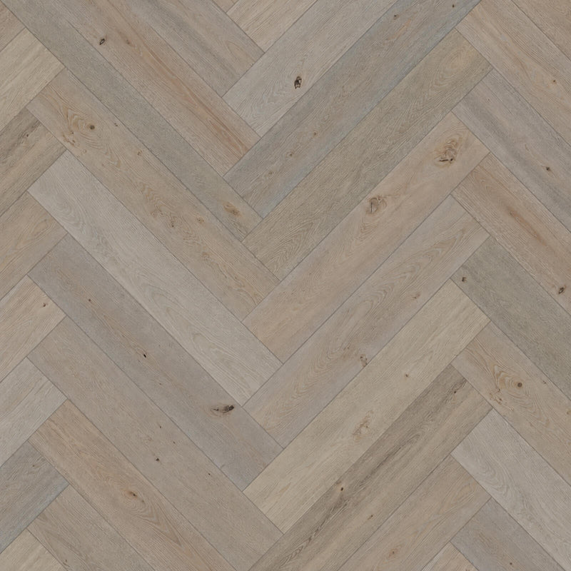 Pyrenees European oak hardwood flooring with light greige wood grain in a herringbone pattern.