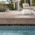 Chocolate Brown Walnut Travertine Tumbled 16 x 24 x 1.25 Bullnose Coping 16x24 pool coping — Spa spa overhang edge