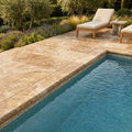 Chocolate Brown Walnut Travertine Tumbled 16 x 24 x 2 Bullnose Coping 16x24 pool coping — Swimming Pool pool edge drop-face coping