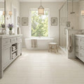 Classic 12x24 Combed Limestone Tile — Primary Bath floor