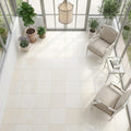 Classic 18x18 Honed Limestone Tile — Sunroom floor