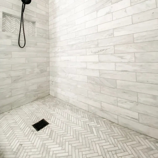 Completa Series Bianco Venatino 1x4x3/8 Honed Herringbone Marble Mosaic