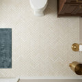Completa Marble Series Terra Nova 1x4 Herringbone Honed Mesh Marble Mosaic — Powder Room floor