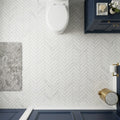 Completa Series Bianco Venatino 1x4x3/8 Honed Herringbone Marble Mosaic — Powder Room floor
