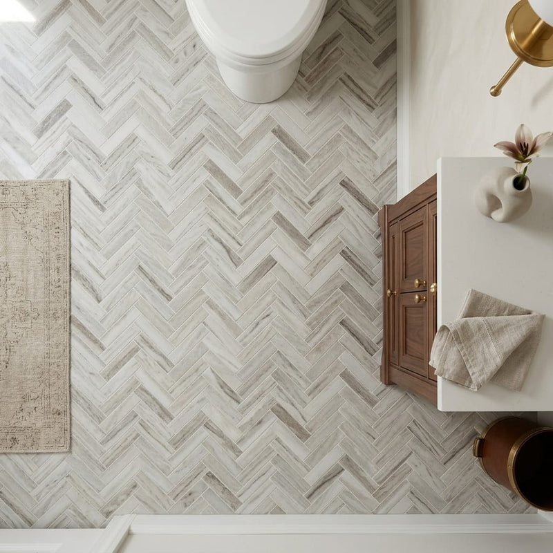 Completa Series Skyline 1x4 Honed Herringbone Marble Mosaic — Powder Room floor