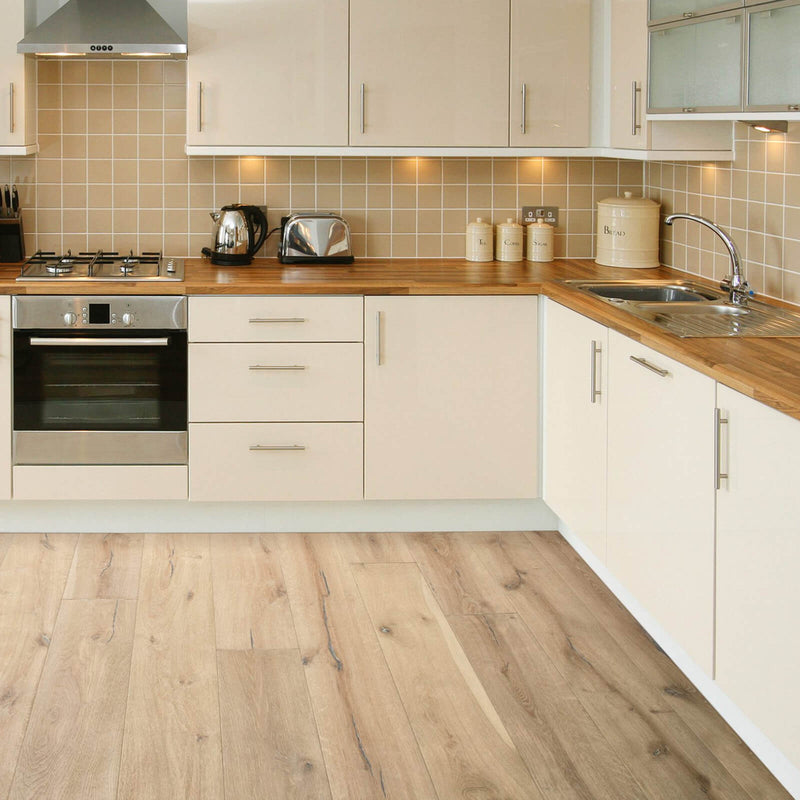 Composer Debussy engineered European oak flooring installed in a kitchen, showing pale natural wood grain, knots and wide planks.