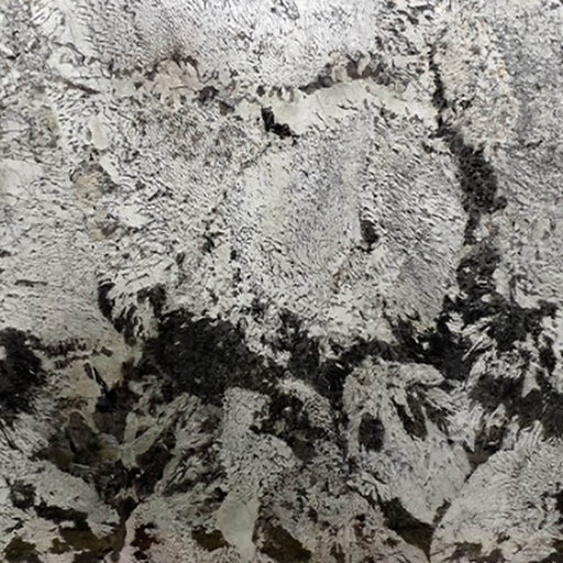 Copenhagen 3cm polished granite slab with a white and gray surface and bold black veining.