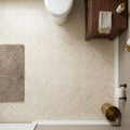 Crema Marfil (Spanish) Marble 1x4 Cream Honed Herringbone Mosaic — Powder Room floor