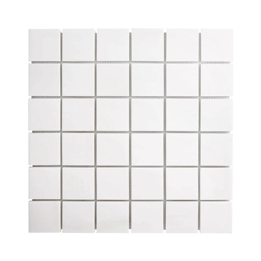 White Bianco Dolomite marble mosaic sheet with 2×2-inch square pieces and a matte honed finish.