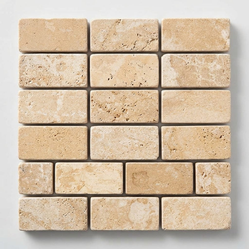 Durango / Paredon (Mexican) - Cross Cut Durango Travertine 1x2 Tumbled Travertine Herringbone Mosaic close-up